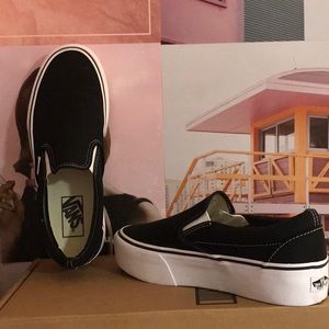 Vans size 8 slip-on platform. Color; Black.